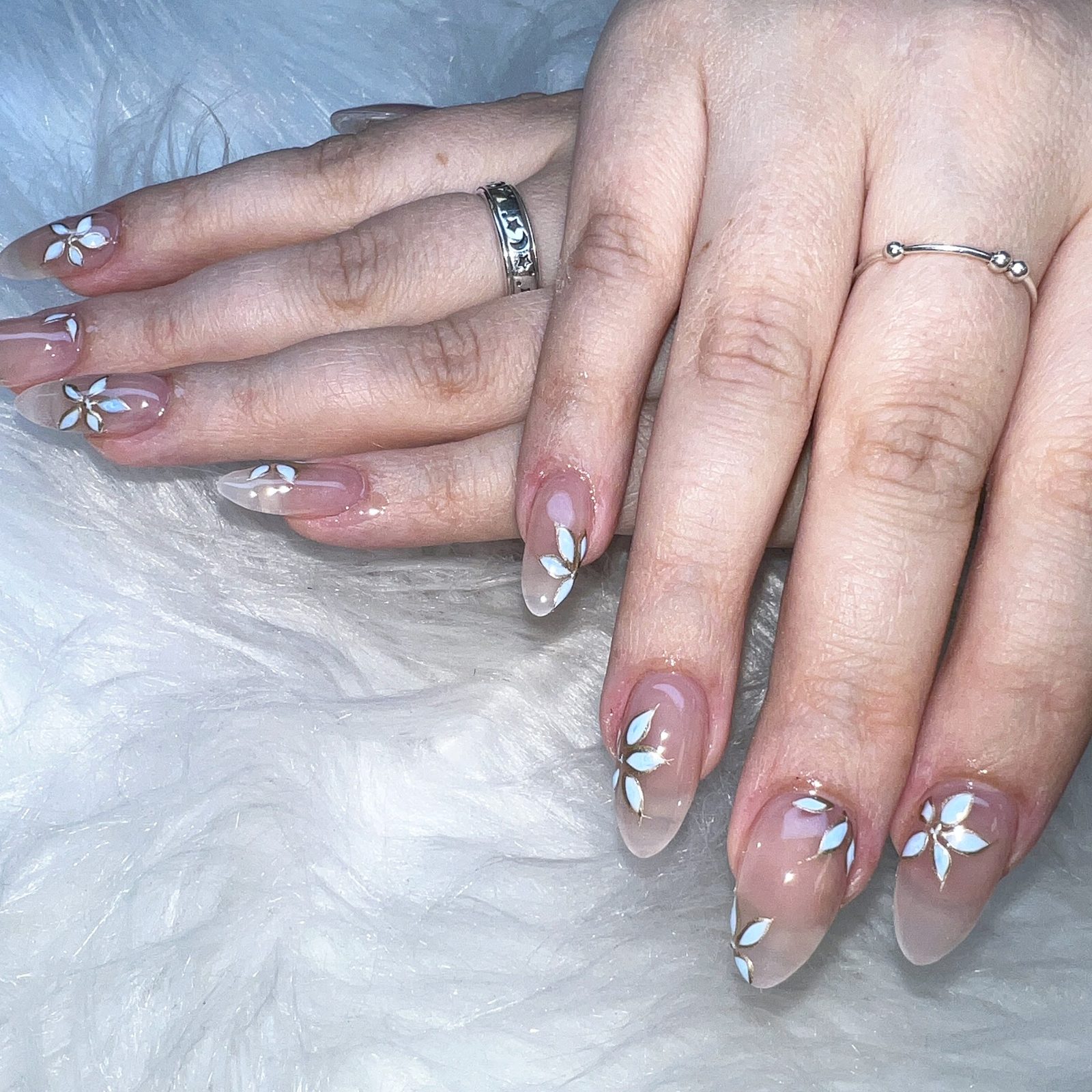 Almond nails with white flower art