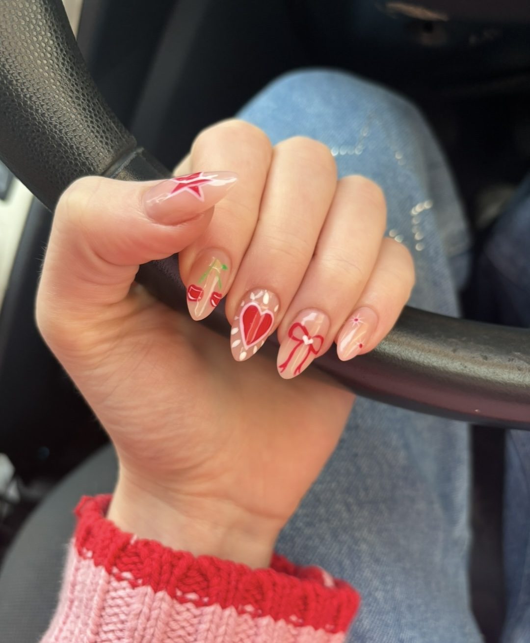 Festive nail art with hearts and stars